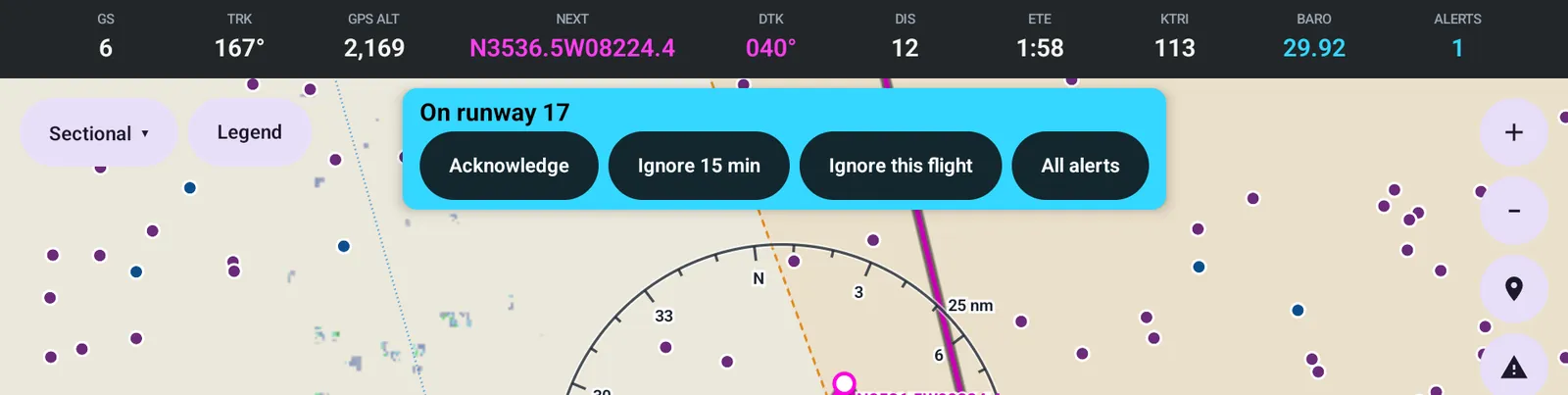 The MFD with a cyan alert banner reading On runway 17, with Acknowledge, Ignore 15 min, Ignore this flight and All alerts buttons, under the data strip.